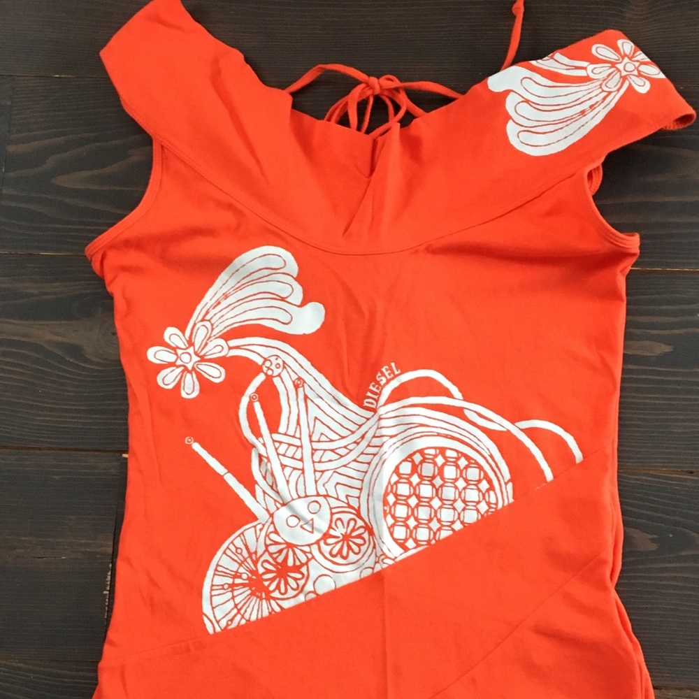 Diesel orange shirt. Cowl neck with tie in back. Could be worn off shoulders.